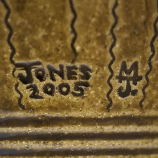 Image of Mark and Signature Jones 2005 MJ on undefined, on the - None -, Inscribed, in the shape of a Rectangle with the letters e, j, n, o, s, 